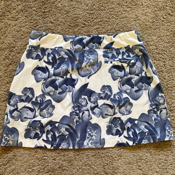 Puma Dresses & Skirts - Puma women’s small white / blue athletic skirt